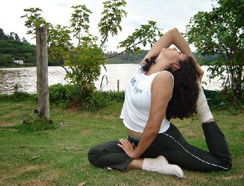 a woman doing yoga